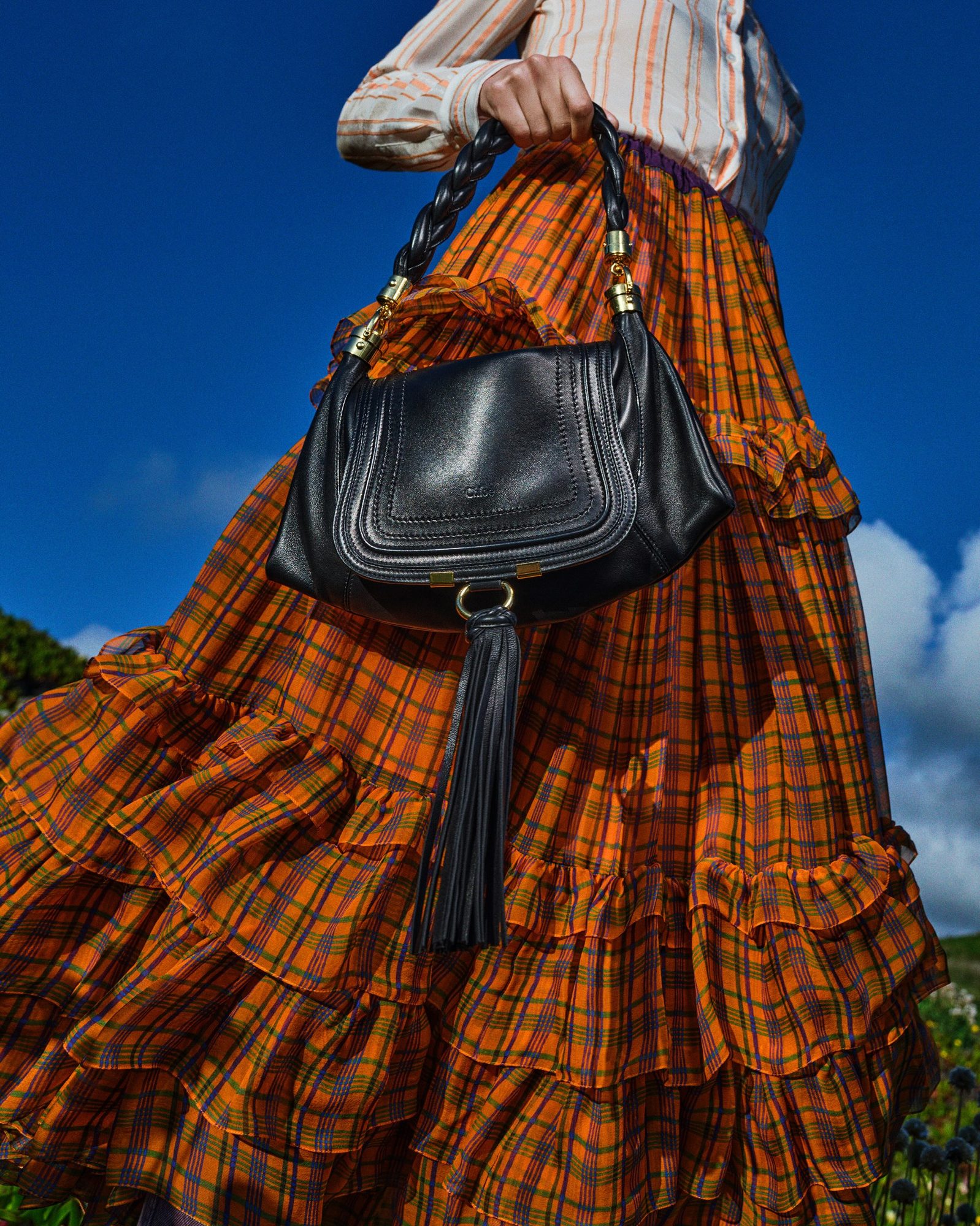 Le tartan et l'argyle comme motifs signatures de cet automne 3 Jupe longue tartan FW26 Chloé