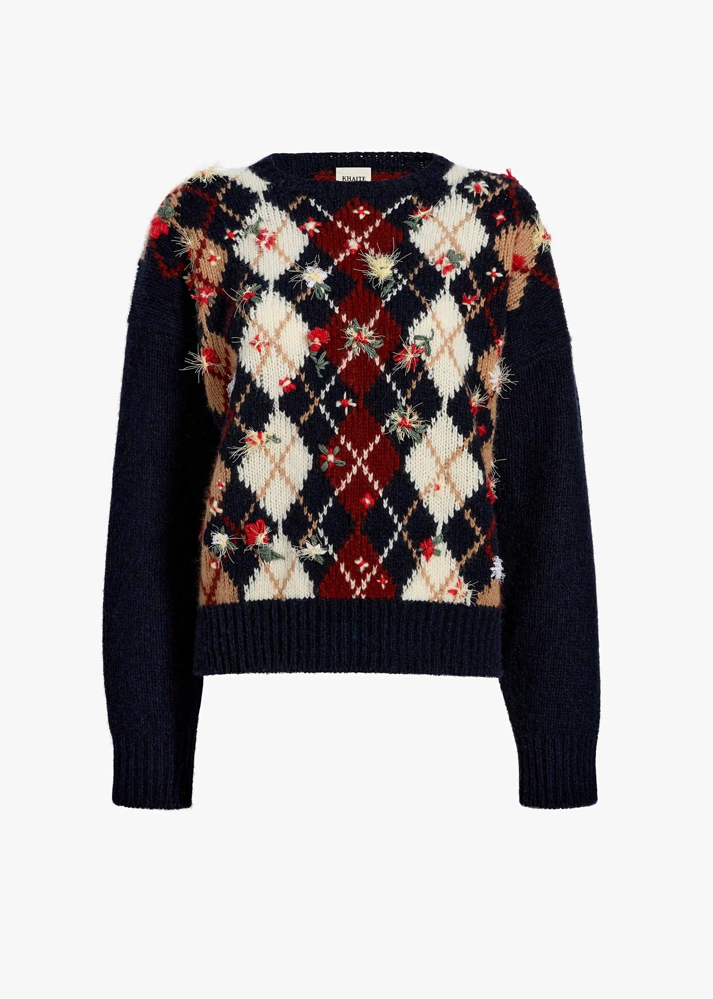Le tartan et l'argyle comme motifs signatures de cet automne 7 Pull en maille motif argyle et fleurs Khaite
